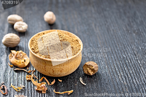 Image of Nutmeg round in bowl on board