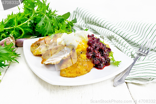 Image of Turkey breast with cranberry sauce on light board