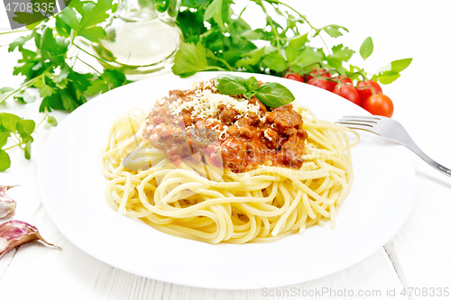 Image of Spaghetti with bolognese on white board