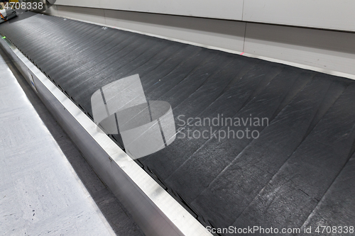 Image of Empty baggage claim area at airport