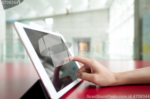 Image of Woman use of tablet pc