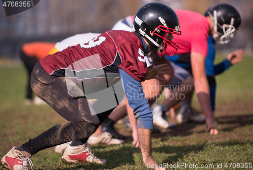 Image of american football team in action