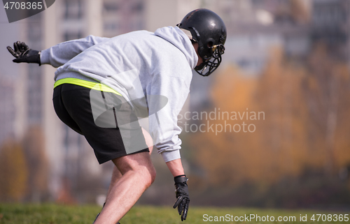 Image of american football player in action