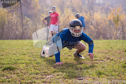 Image of american football player in action