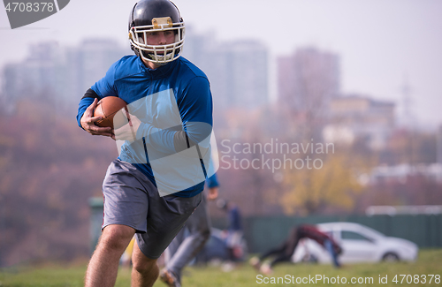 Image of american football team in action