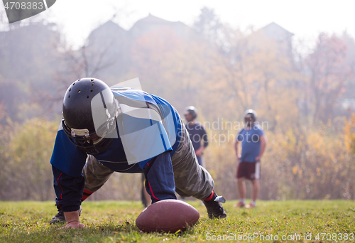 Image of american football player in action