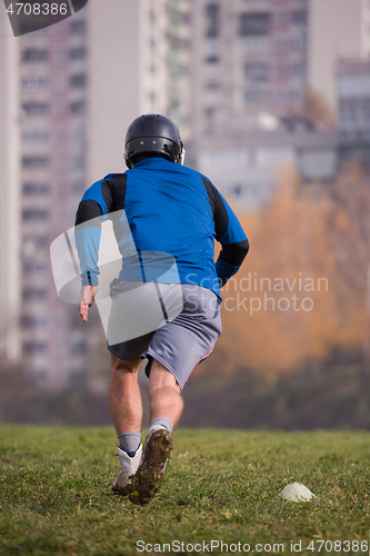 Image of american football player in action