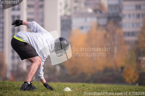 Image of american football player in action