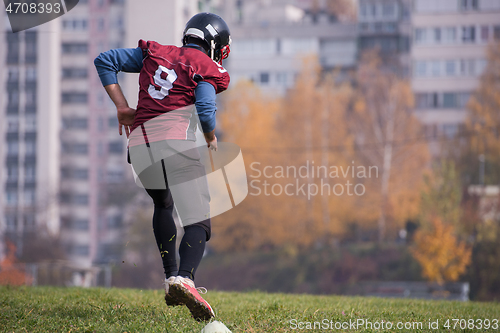 Image of american football player in action