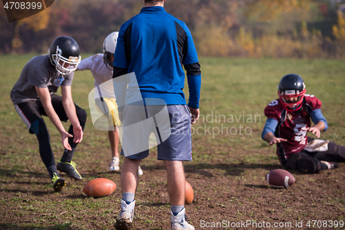 Image of american football team in action