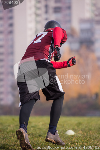 Image of american football player in action