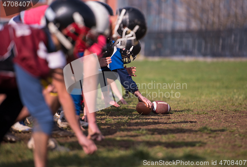 Image of american football team in action