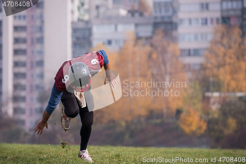 Image of american football player in action