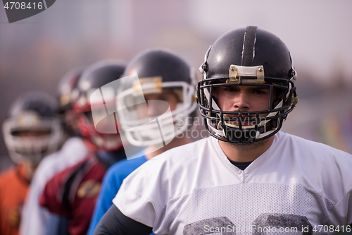 Image of portrait of young american football team