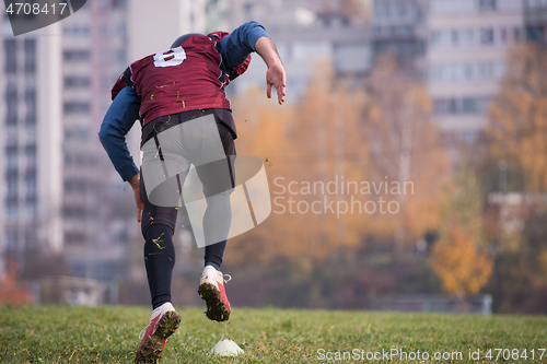 Image of american football player in action