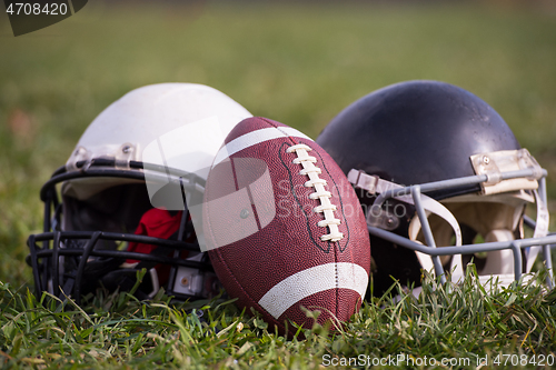 Image of American football helmets and ball