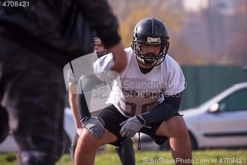 Image of american football team in action