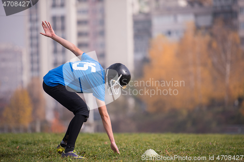 Image of american football player in action