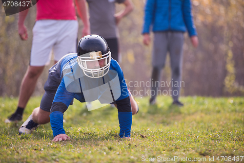 Image of american football player in action