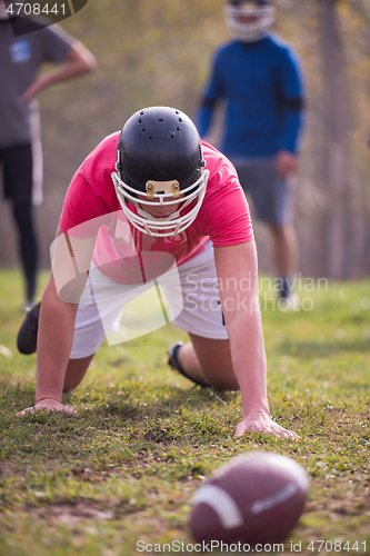 Image of american football player in action