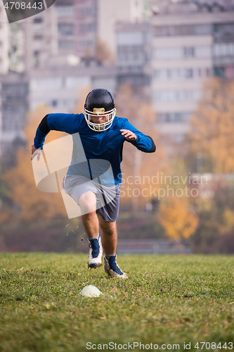 Image of american football player in action