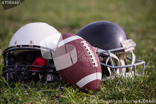 Image of American football helmets and ball