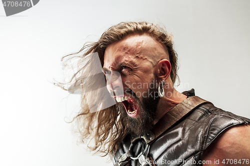 Image of Man in cosplaying Thor isolated on white studio background