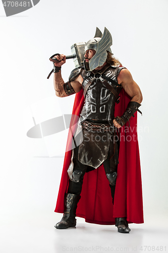 Image of Man in cosplaying Thor isolated on white studio background