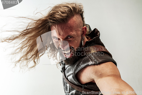 Image of Man in cosplaying Thor isolated on white studio background