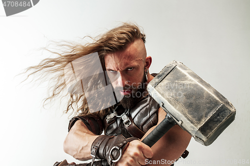 Image of Man in cosplaying Thor isolated on white studio background