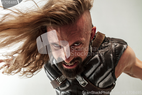 Image of Man in cosplaying Thor isolated on white studio background