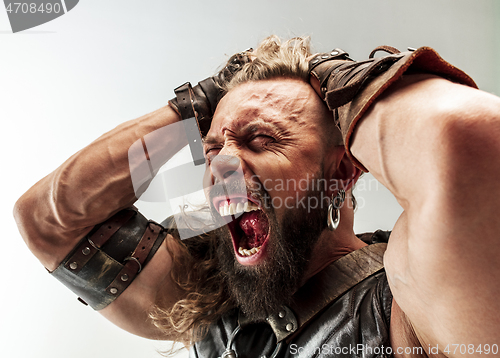 Image of Man in cosplaying Thor isolated on white studio background