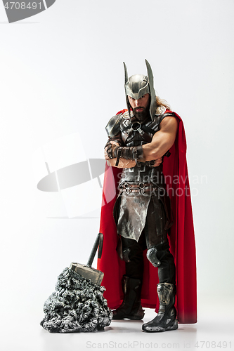 Image of Man in cosplaying Thor isolated on white studio background