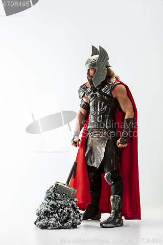 Image of Man in cosplaying Thor isolated on white studio background