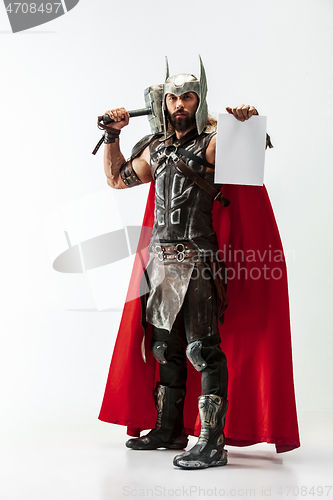 Image of Man in cosplaying Thor isolated on white studio background