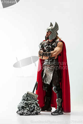 Image of Man in cosplaying Thor isolated on white studio background