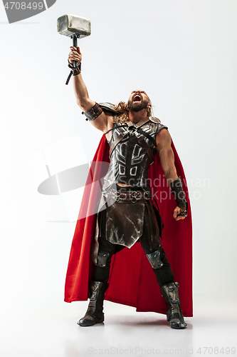 Image of Man in cosplaying Thor isolated on white studio background