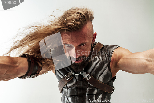 Image of Man in cosplaying Thor isolated on white studio background