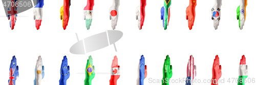 Image of Hands colored in flags of participating countries of The Group of Twenty