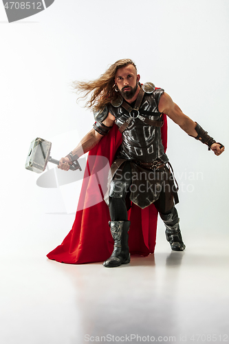 Image of Man in cosplaying Thor isolated on white studio background