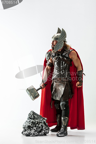 Image of Man in cosplaying Thor isolated on white studio background