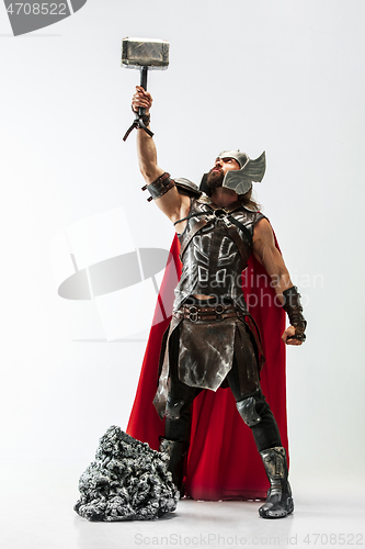 Image of Man in cosplaying Thor isolated on white studio background