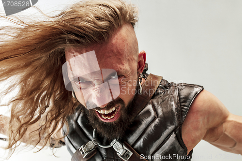 Image of Man in cosplaying Thor isolated on white studio background