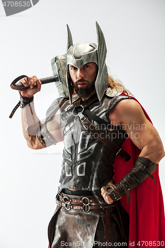 Image of Man in cosplaying Thor isolated on white studio background