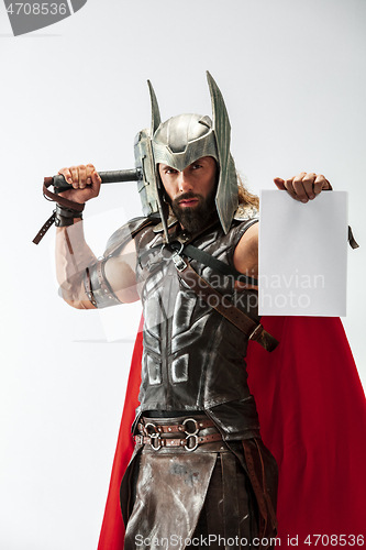 Image of Man in cosplaying Thor isolated on white studio background