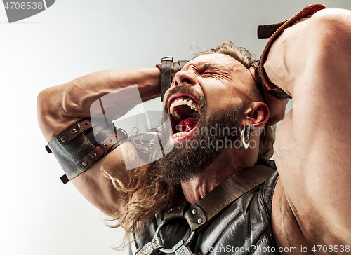 Image of Man in cosplaying Thor isolated on white studio background