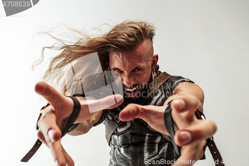 Image of Man in cosplaying Thor isolated on white studio background