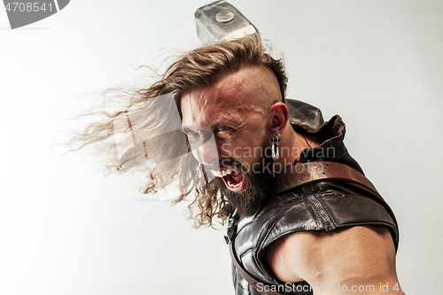 Image of Man in cosplaying Thor isolated on white studio background