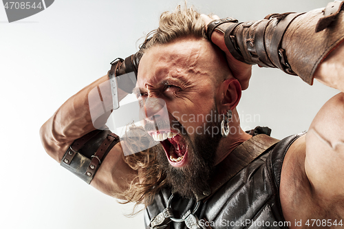 Image of Man in cosplaying Thor isolated on white studio background