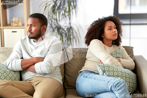 Image of unhappy couple having argument at home